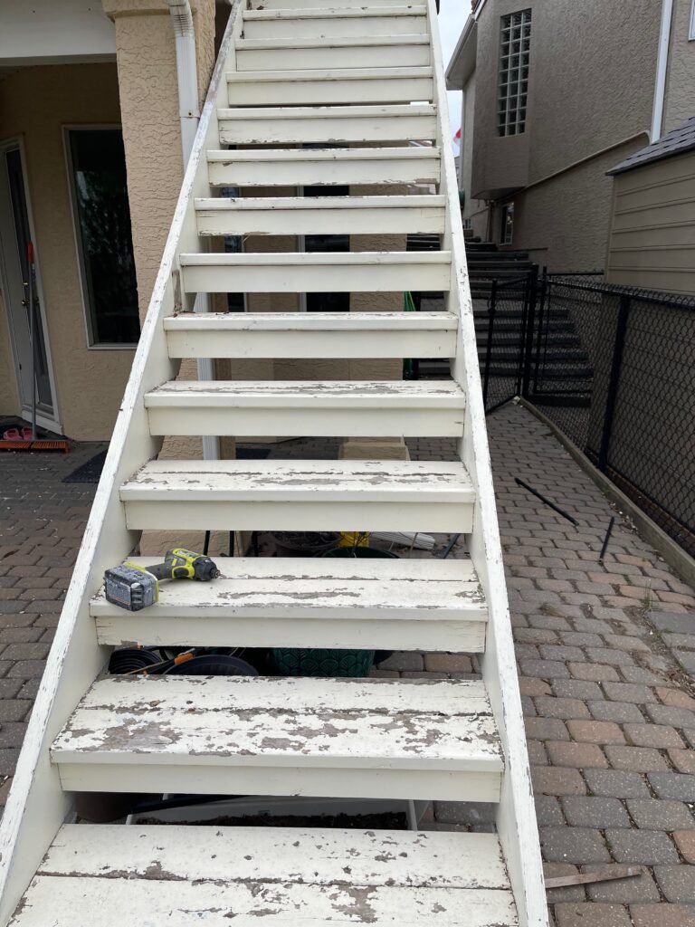 Worn white-painted outdoor staircase before renovation by Dandy RenoWork
