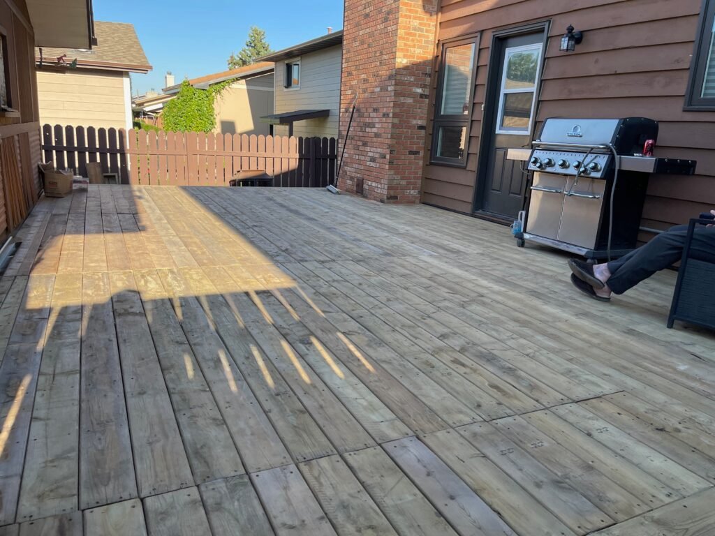 New wooden deck built outside a home by Dandy RenoWork